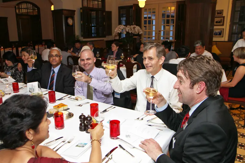 Guests Toasting Each Other During Dinner